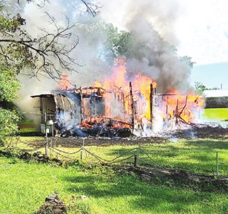 DeSoto Fire District 1 Sets Control Burn Fire to Logansport Home