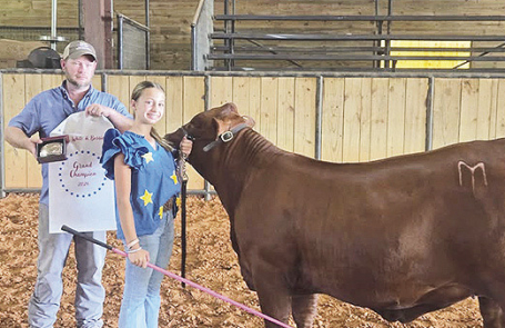 Addison Salley Takes Home Titles of Grand Champion Heifer and Supreme Overall Heifer