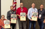 DeSoto Dy. Chief Phillip Daniels (standing on right end) with honorees.