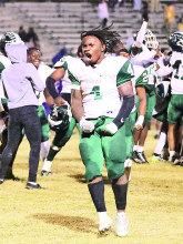 Wolverines Win First-Round Playoff Game 34-28