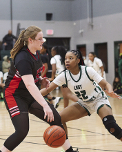 Both Mansfield High Lady Wolverines and Wolverines Defeat Many