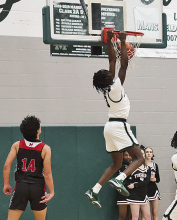 Both Mansfield High Lady Wolverines and Wolverines Defeat Many