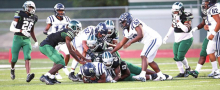 Wolverines Fall to Raiders in Tough Friday Night Battle