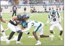 Wolverines Fall to Raiders in Season Opener 38-26