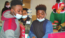 MES Participates in Global Service Shoe Box Project