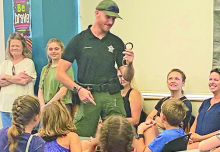 DPSO Visits Stonewall Library with K-9, Units and Vehicles