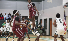 MHS Basketball Teams Come Up with Two Wins
