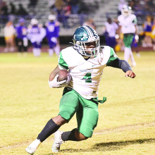 Wolverines Win First-Round Playoff Game 34-28
