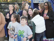The 4-H’ers who helped build the Children Coalition’s food pantry were honored at the ribbon cutting ceremony in November.