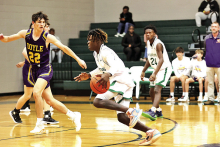 MHS Wolverines Advance to State Playoffs After Crushing Doyle 72 to 49