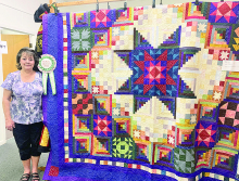Sheriff Jayson Richardson’s Award Quilt - This award goes to Tina Huey’s Amish with a Twist II. This quilt was pieced by Tina when our group was making a block of the month quilts. Each month we learned and made a new set of blocks for the quilt for a