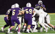Kinder Yellowjackets Defeat Logansport Tigers