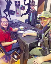 DeSoto School Resource Officer Participates in NDUE Glow Party