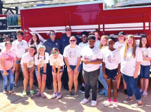 Logansport Jr. High Cheer & Pep Squad Disburse Water for Community Project