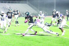 Wolverines Win First Round Playoff Game 58-14