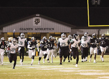 Wolverines Fall to Giants in Third Round of Football Playoffs