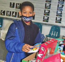 MES Participates in Global Service Shoe Box Project