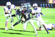 Wolverines Win First Round Playoff Game 58-14