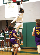 MHS Wolverines Advance to State Playoffs After Crushing Doyle 72 to 49