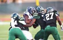 Wolverines Fall to Raiders in Tough Friday Night Battle