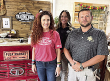 Holly Kennedy-Jones (left) is pictured with her former bosses Chief Monica Cason and Sheriff Jayson Richardson of the DeSoto Parish Sheriff’s Office, who stopped by her new business to check on their friend.
