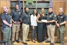 September’s DPSO’s Whiskers for Charity go to HGM Community Development Corporation