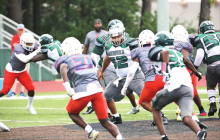 Wolverines Hosted Cowboys in a Thursday Evening Scrimmage