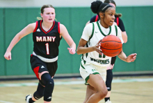 MHS Wolverines and Lady Wolverines Stomp Many Tigers