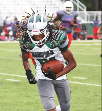Wolverines Hosted Cowboys in a Thursday Evening Scrimmage