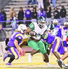Wolverines Win First-Round Playoff Game 34-28