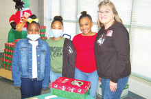 MES Participates in Global Service Shoe Box Project