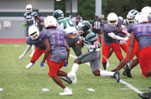 Wolverines Hosted Cowboys in a Thursday Evening Scrimmage