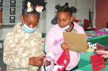 MES Participates in Global Service Shoe Box Project