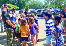 DPSO Visits Stonewall Library with K-9, Units and Vehicles