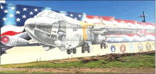 Mural Artist Completes Work of Art in Mansfield
