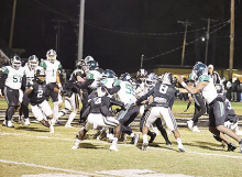 Wolverines Fall to Giants in Third Round of Football Playoffs
