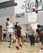 Both Mansfield High Lady Wolverines and Wolverines Defeat Many