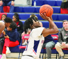 North DeSoto Griffins Fall to Logansport Tigers 51 to 56