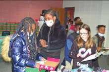 MES Participates in Global Service Shoe Box Project