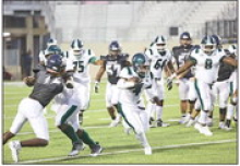 Wolverines Fall to Raiders in Season Opener 38-26