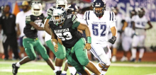 Wolverines Fall to Raiders in Tough Friday Night Battle