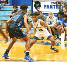 Pleasant Hill Eagles Soar Over Stanley Panthers 68 to 45