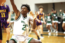 MHS Wolverines Advance to State Playoffs After Crushing Doyle 72 to 49