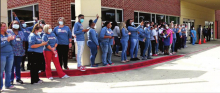 Area First Responders Participate in “Light It Up” Honoring DRHS Employees