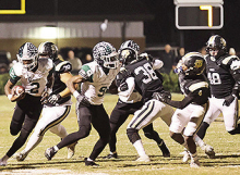 Wolverines Fall to Giants in Third Round of Football Playoffs